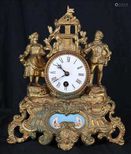 Small Victorian mantle clock with figural