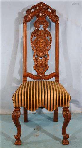Walnut high back heavily carved chair with stripe