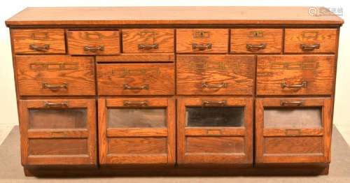 Late 19th Century Oak Country Store Seed Cabinet.