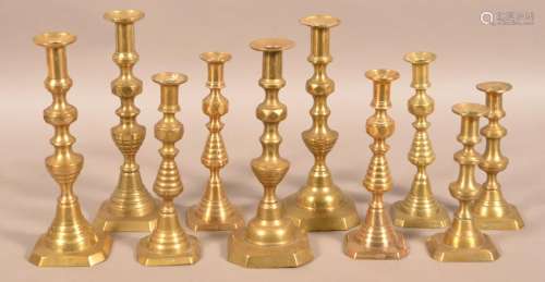 Five Matched Pair of Antique Brass Candlesticks