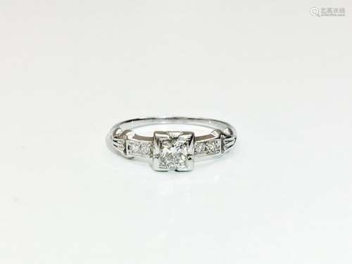 18K white gold, 1/3 carat diamond engagement ring