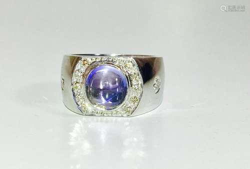 3.50 CT Blue Sapphire, VVS Diamonds in 18k gold ring.