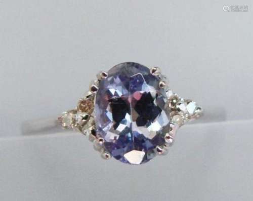 Tanzanite: 1.10 & Diamond: .14Carat Ring 14K W/g