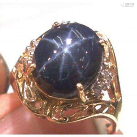 Blue Star Sapphire: 5.20 Ct Dia: .10 Ct 14k Y/g