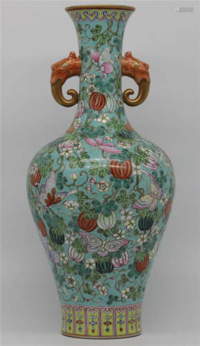 Turquoise green glazed double-ear bottle in the middle of Qing Dynasty