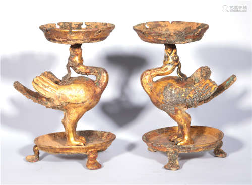 A pair of bronze gilded lampstands in the Tang Dynasty