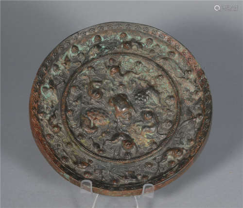 Bronze Sea Beast Flower and Bird Mirror in Tang Dynasty