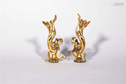 A pair of bronze clad gold flying apsaras in the Tang Dynasty