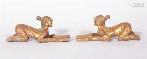 A pair of copper-clad gold kneeling men in the Han Dynasty