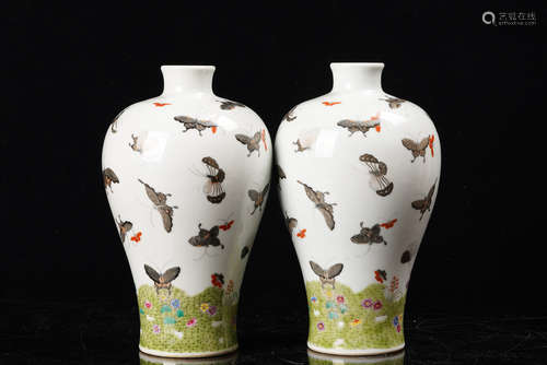 A Pair of Chinese Tri-colored Glazed Butterfly Porcelain Plum Vases