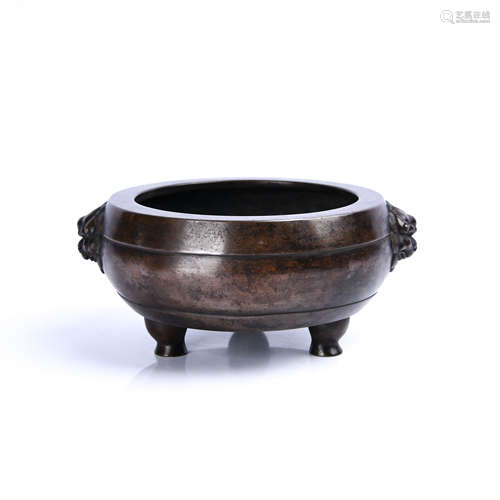 A Chinese Bronze Three-legged Censer with Lion Ears