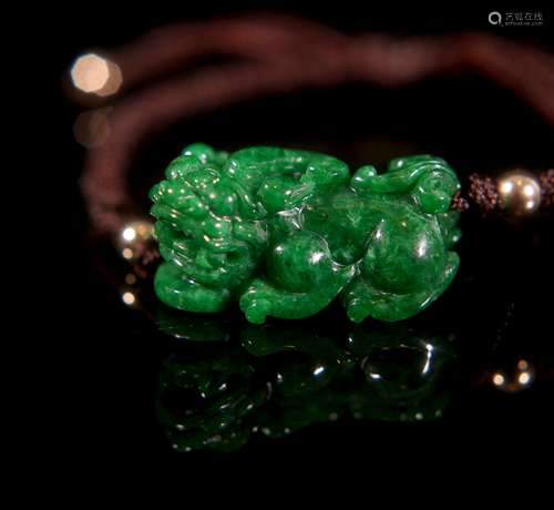 A Chinese Jadeite Pixiu Pendant