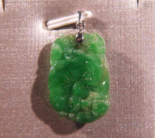 A Chinese Jadeite Twin Monkeys Pendant