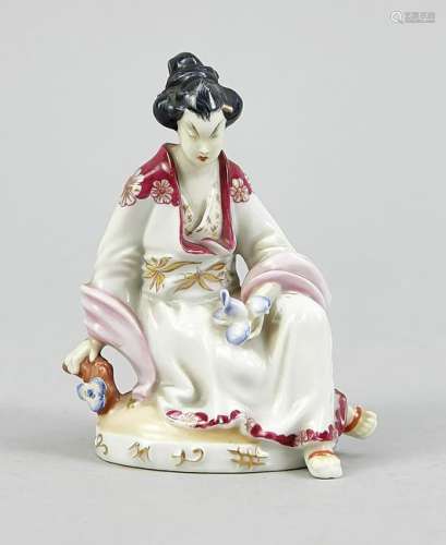 Seated Chinese woman with