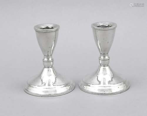 A pair of candlesticks, U