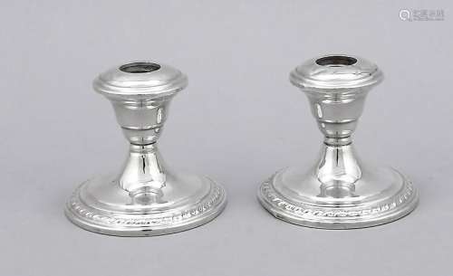 A pair of candlesticks, U