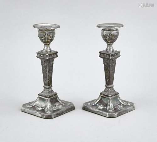 A pair of candlesticks, E