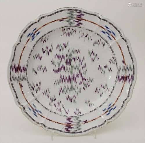 Seltener Teller mit Atlasdekor / A rare plate with