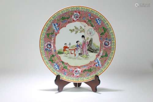 A Porcelain Plate Display in Fencai Polychrome Enamels