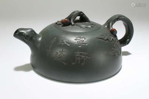 A Chinese Lidded Tea Pot Display