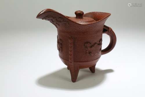 A Chinese Lidded Tri-podded Tea Pot Display