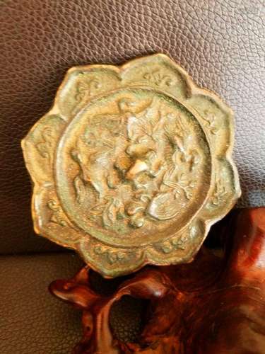 A Bronze Plate Ornament with Birds Carved