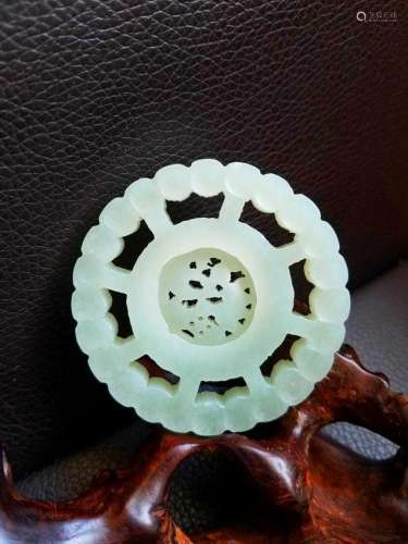 A White Jade Carved Round Ornament