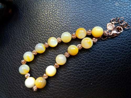 A Yellow String of Buddha Beads