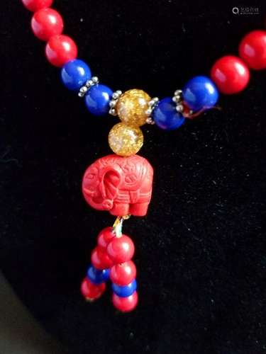 A Red-Blue String of Buddha Beads