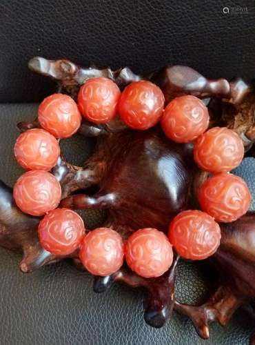 An Orange String of Buddha Beads