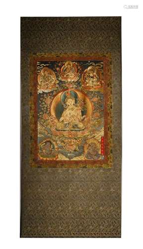 AN ANTIQUE HANDPAINTED ON SILK THANGKA