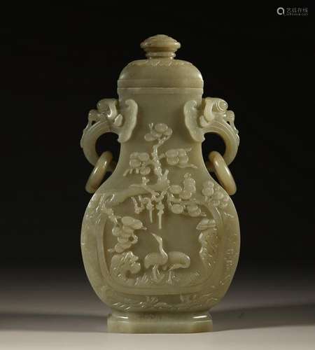 A PALE CELADON JADE CARVED VASE