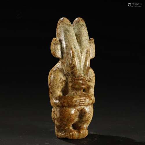 ARCHAISTIC JADE CARVING OF A DEITY