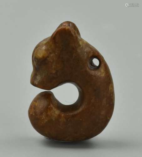 An Archaic Brown Jade Animal Pendant