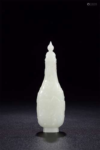 A CHINESE HEITAN JADE CARVED CRANE AND PINE VIEWS VASE