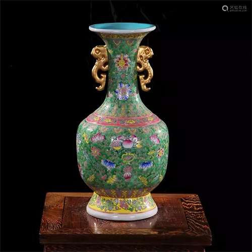 A CHINESE PORCELAIN GREEN GLAZE FLOWER DOUBLE HANDLE VIEWS VASE