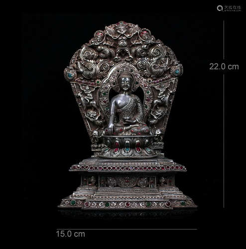 A CHINESE PURE SILVER SEATED BUDDHA SAKAYMUNI GEM STONE INLAID