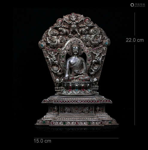 A CHINESE PURE SILVER SEATED BUDDHA SAKAYMUNI GEM STONE INLAID
