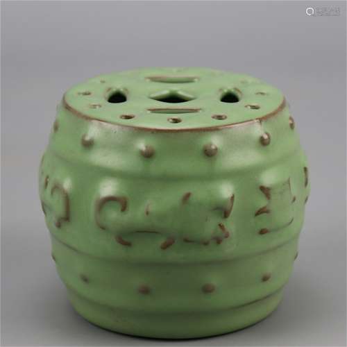 A CHINESE PORCELAIN GREEN GLAZE CARVED STOOL TABLE ITEM