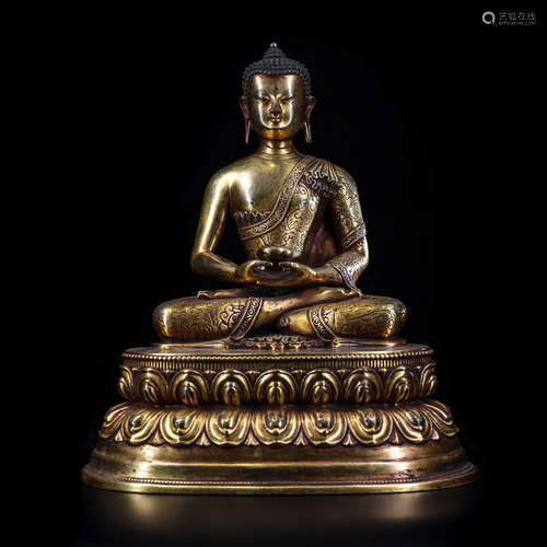 A CHINESE GILT BRONZE SAKAYMUNI SEATED BUDDHA