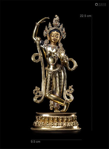 A CHINESE GILT BRONZE STANDING WHTE BUDDHA