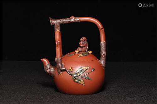 A FINE CHINESE LONG HANDLE TEAPOT