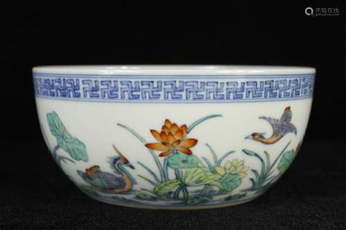 A CHINESE PORCELAIN FLOWER AND BIRD BRUSH WASHER