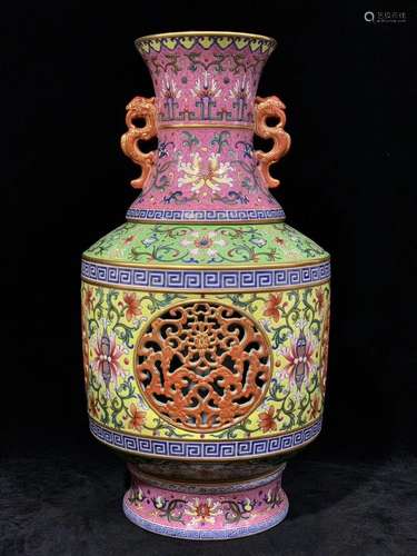 A CHINESE PORCELAIN FAMILLE ROSE CARVED DOUBLE HANDLE VASE