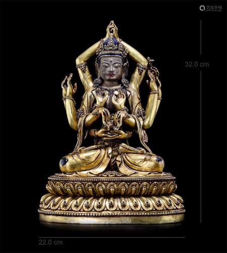 A CHINESE GILT BRONZE SEATEDING TWELVE ARM GUANYIN