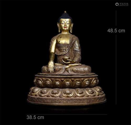 A CHINESE GILT BRONZE SEATED SAKAYMUNI BUDDHIST