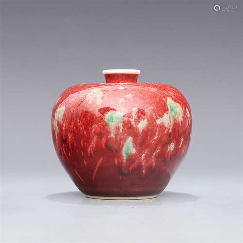 A CHINESE PORCELAIN RED GLAZE ZUN VASE