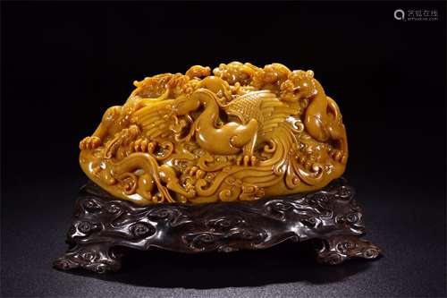 A CHINESE CARVED TIANHUAN STONE BEAST TABLE ITEM