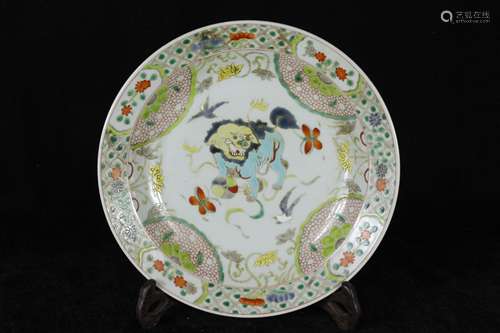 A CHINESE PORCELAIN  FAMILLE ROSE LION PLATE