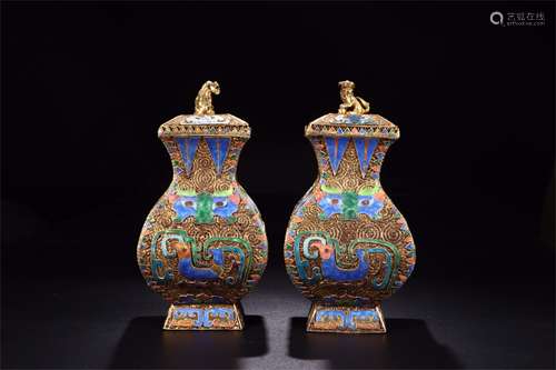 A PAIR OF CHINESE GILT SIVLER ENAMEL PHOENIX FIGURES LIDDED VASE